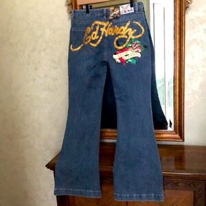 New Ed Hardy designer flare blue jeans with embroidered appliqué.  Size 32.